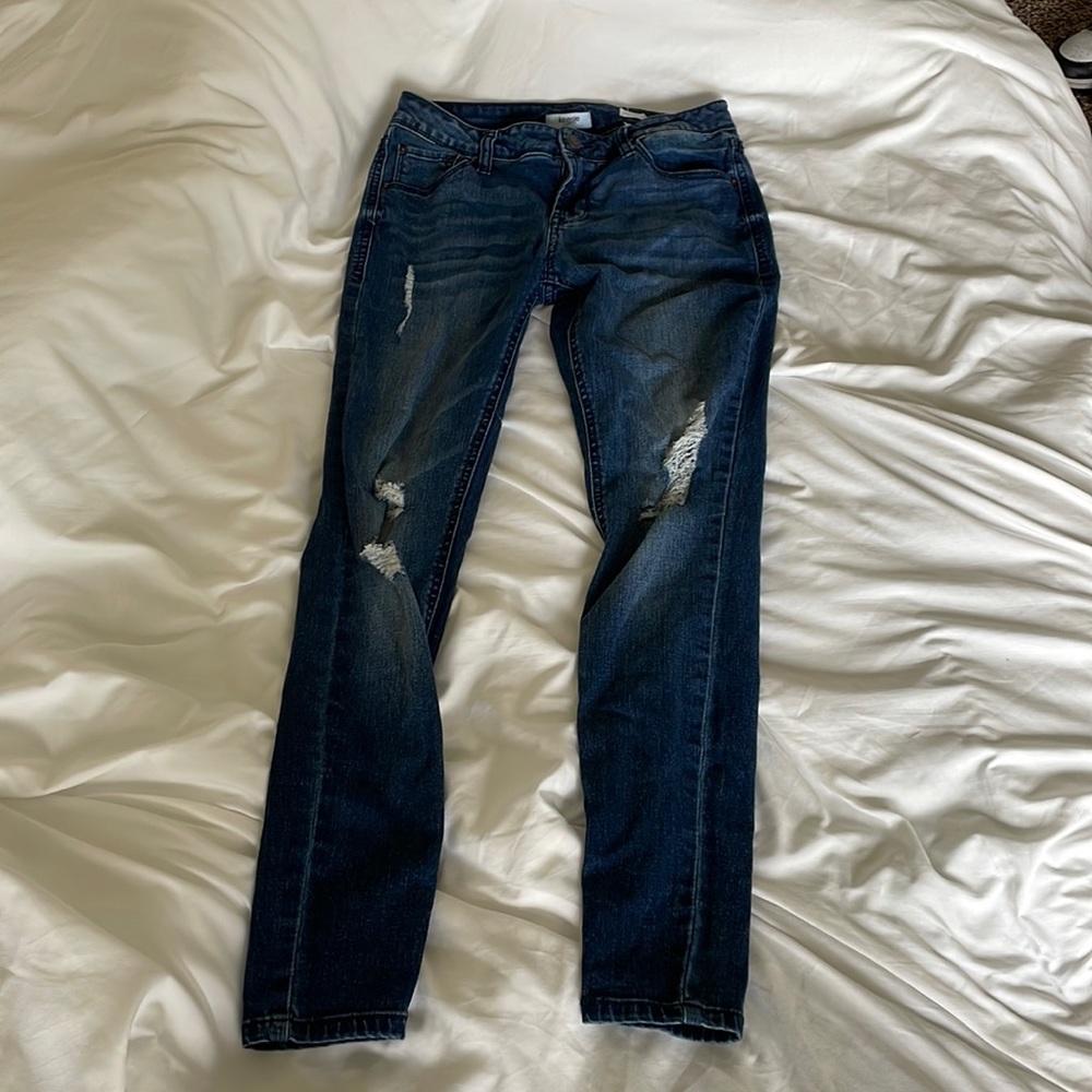 Ripped dark denim jeans